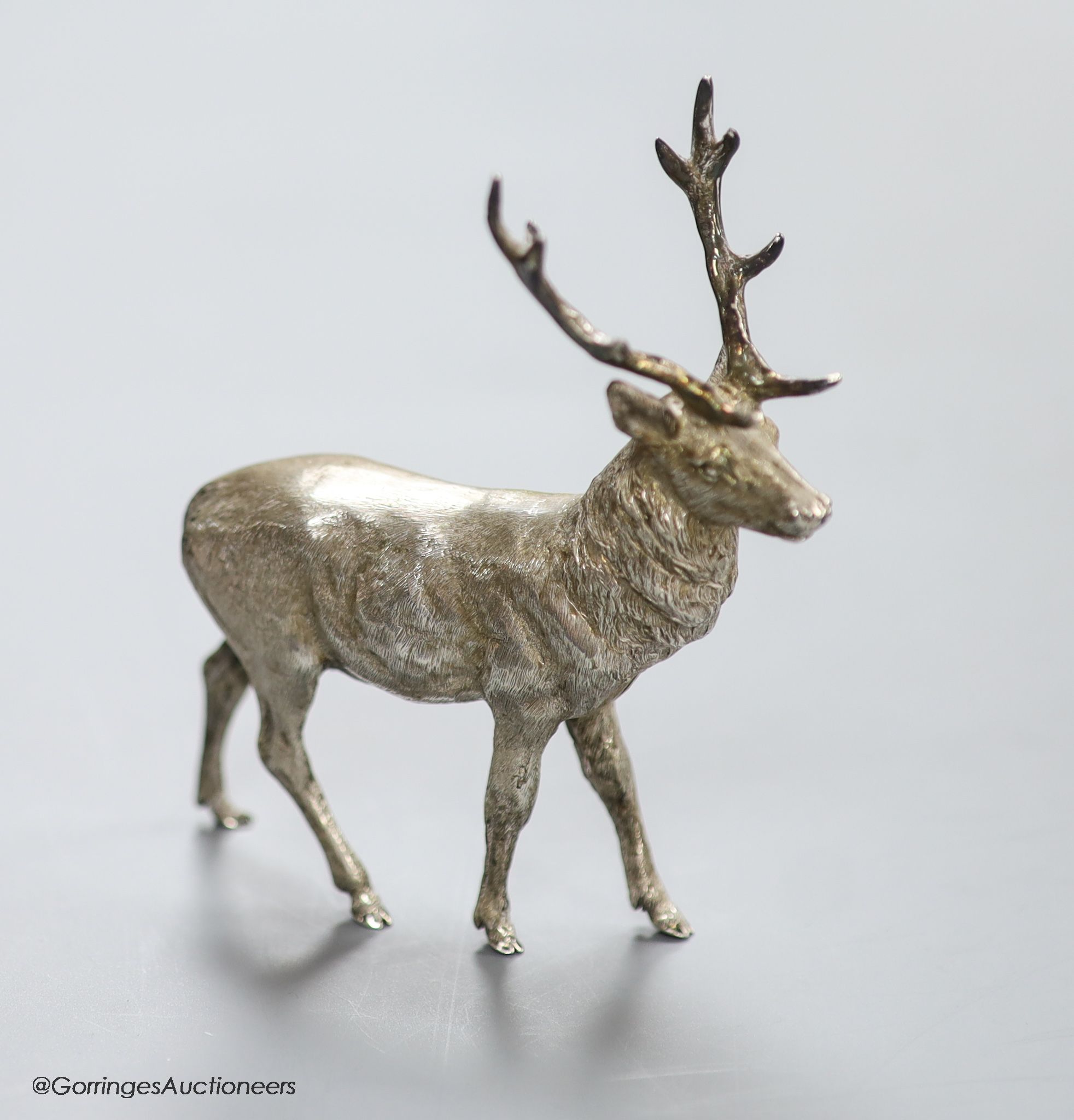 A modern free standing silver miniature model of a stag, C.F.H & Co, London, 1990, height 10.9cm, 162 grams.
